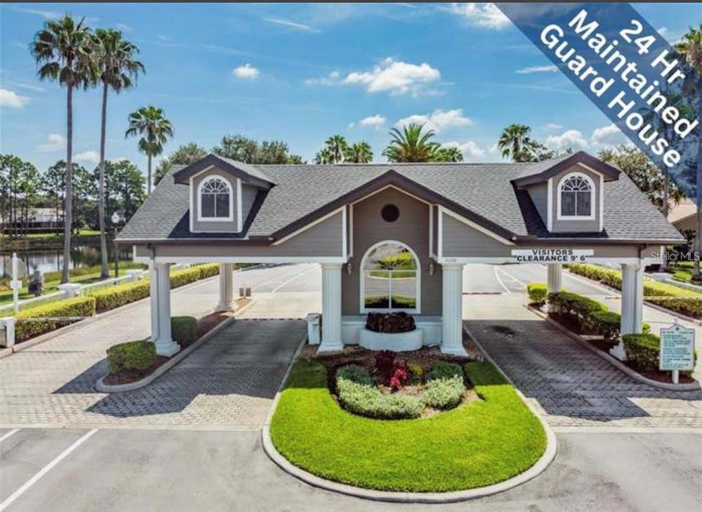 1520 Canberley Court Trinity, FL 34655 - Photo 21 of 35 a view of a house with a swimming pool