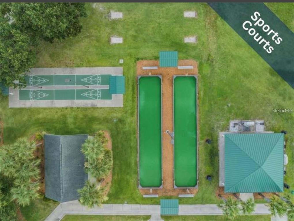 1520 Canberley Court Trinity, FL 34655 - Photo 29 of 35 a green field with trees in the background