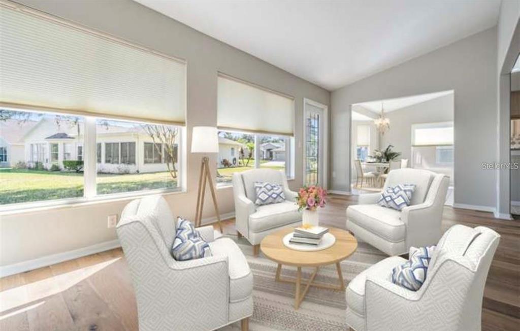 1520 Canberley Court Trinity, FL 34655 - Photo 4 of 35 a living room with furniture and a large window