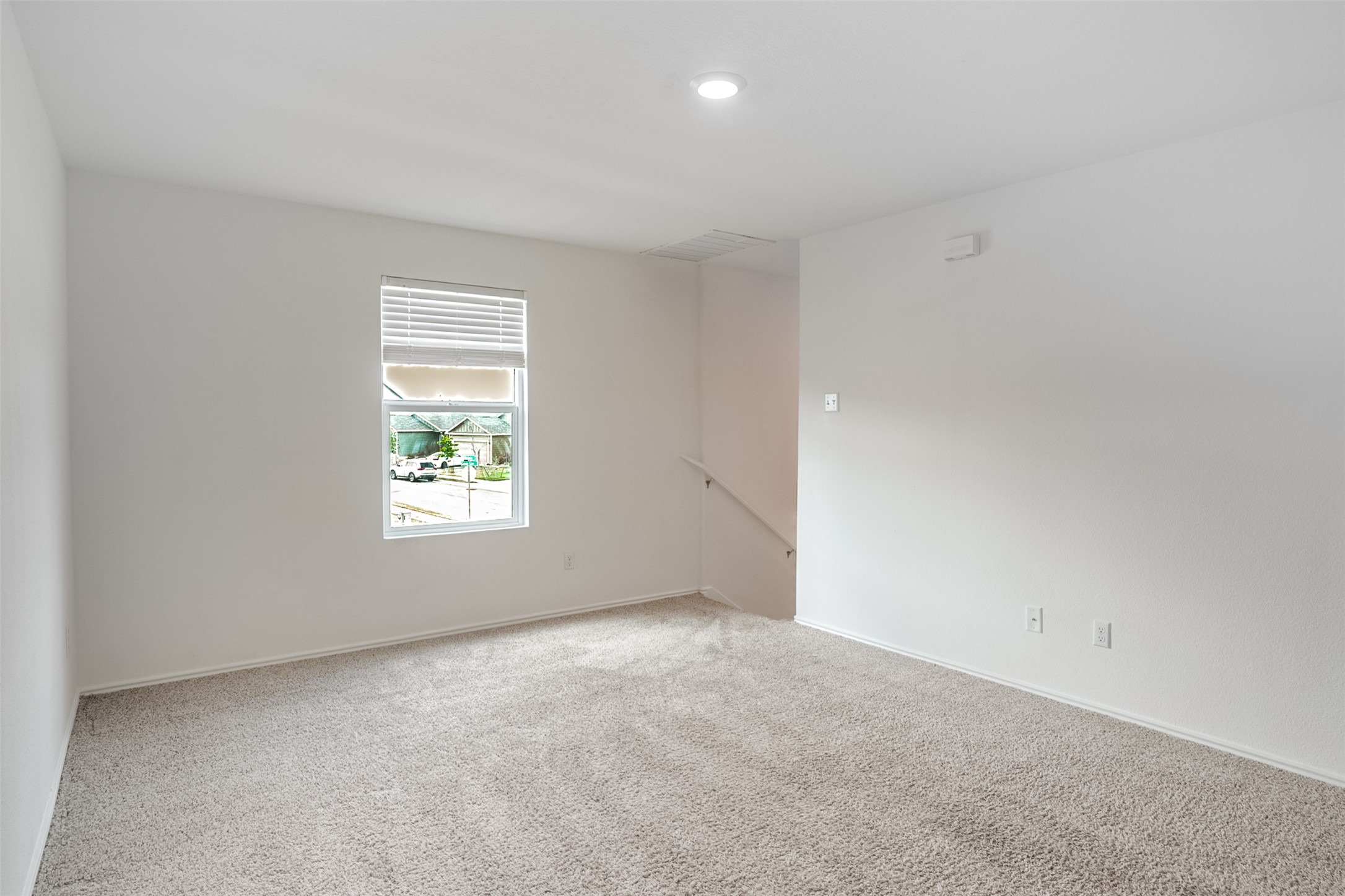 428 Gabbro Gardens Maxwell, TX 78656 - Photo 11 of 26 Carpeted empty room with baseboards