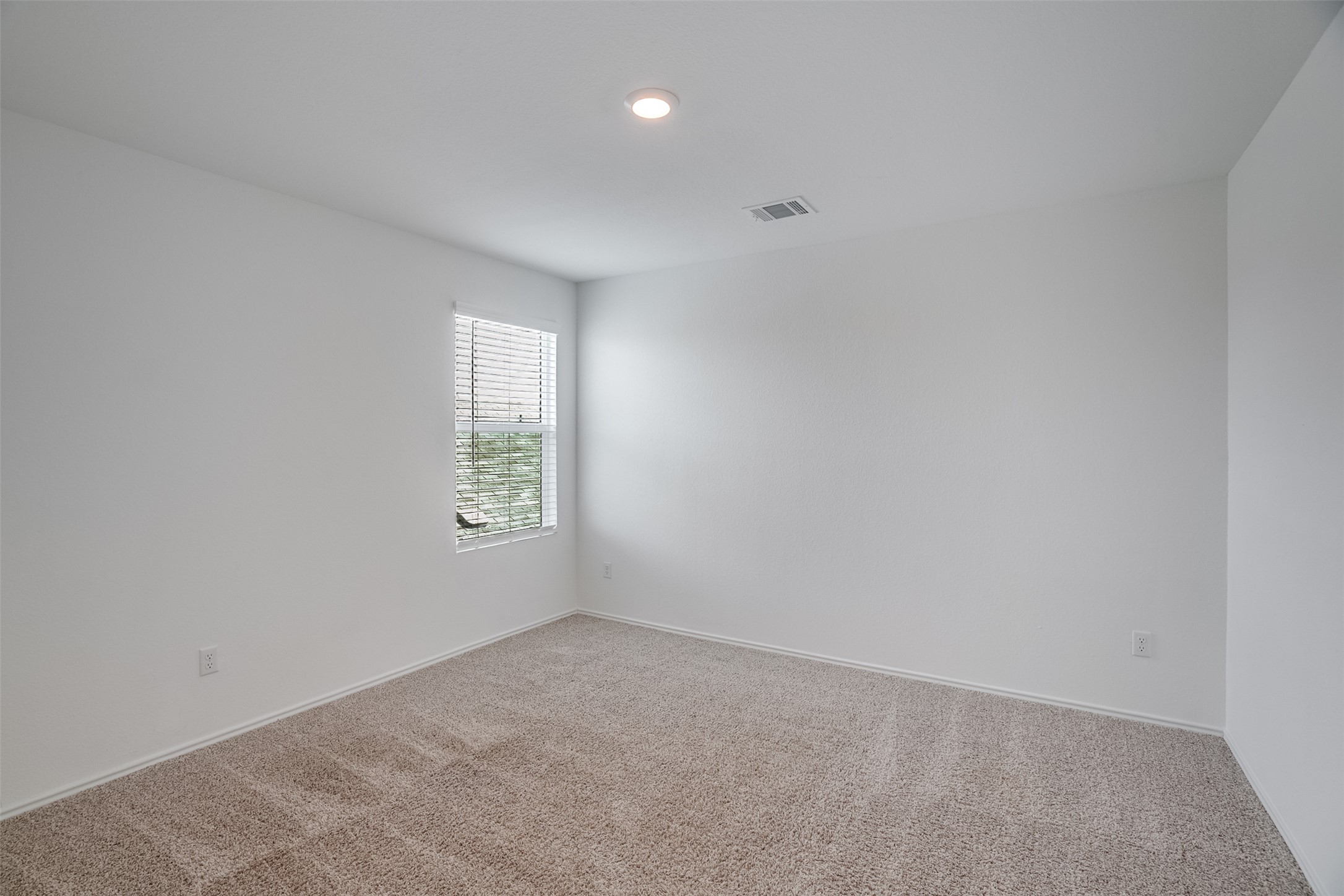 428 Gabbro Gardens Maxwell, TX 78656 - Photo 13 of 26 Carpeted spare room featuring baseboards
