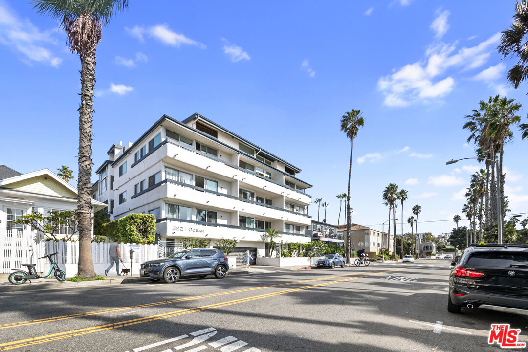 2221 Ocean Avenue, Unit 205 Santa Monica, CA 90405 - Photo 15 of 16 a view of a cars parked in front of a building