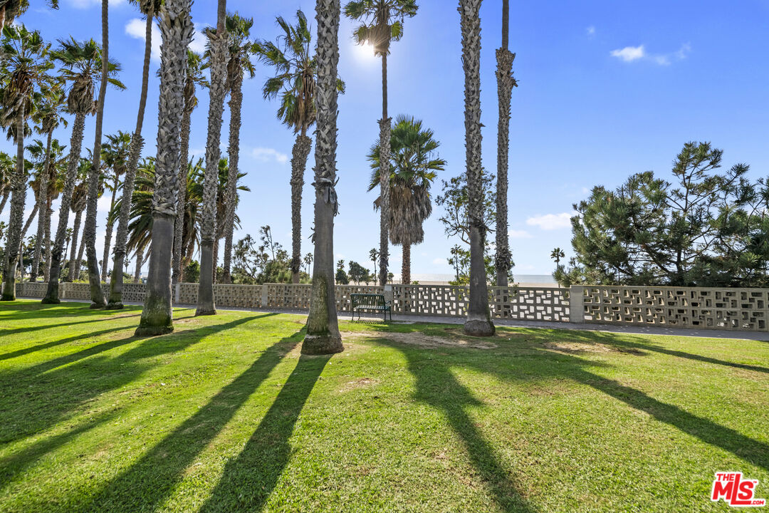 2221 Ocean Avenue, Unit 205 Santa Monica, CA 90405 - Photo 16 of 16 a swimming pool with outdoor seating and yard
