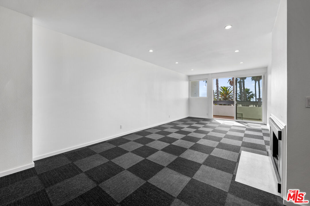 2221 Ocean Avenue, Unit 205 Santa Monica, CA 90405 - Photo 8 of 16 a view of a room with a black and white checkered floor