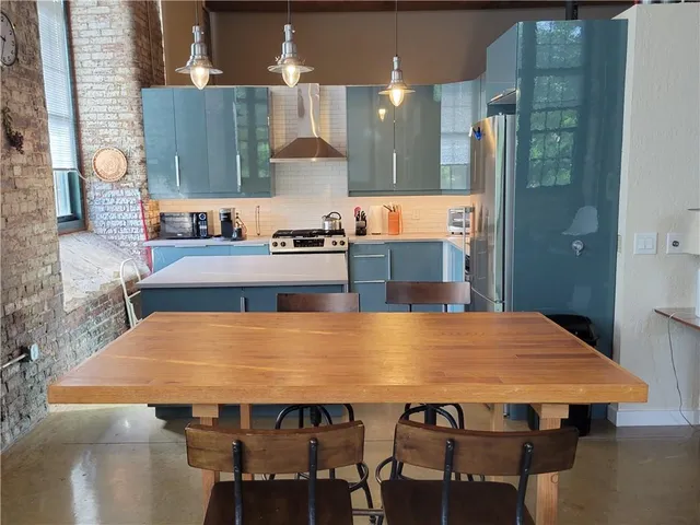 a dining table with chairs and table