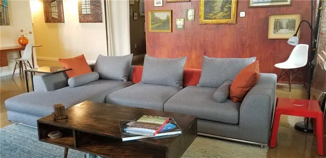 a living room with furniture and a couch