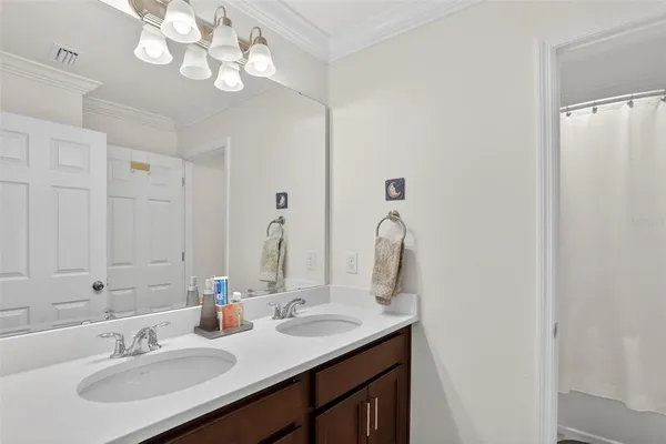 a bedroom with a bed and a cabinets