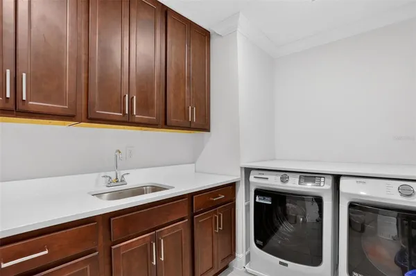 a room with furniture and musical instruments