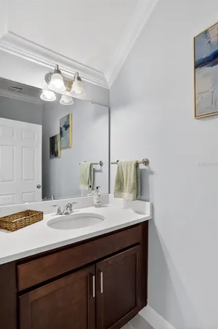 a patio with water slide dining table and chairs