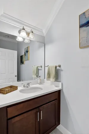 a view of a house with swimming pool and sitting area