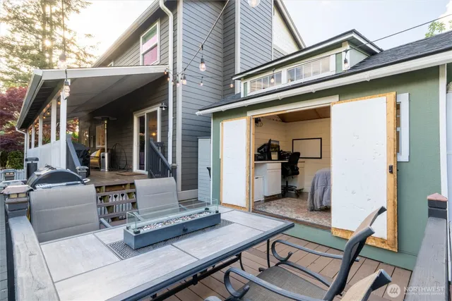 a bedroom with a bed a desk and chair