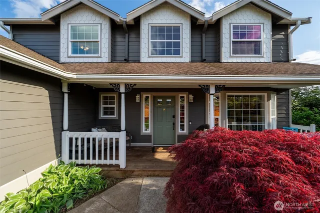 a view of a house with a window and deck