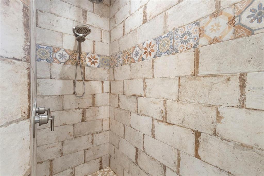 700 Old Geneva Road Geneva, FL 32732 - Photo 26 of 79 a bathroom with a shower