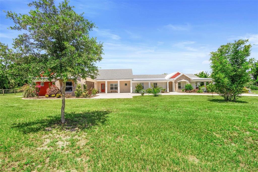 700 Old Geneva Road Geneva, FL 32732 - Photo 3 of 79 a front view of house with yard and green space