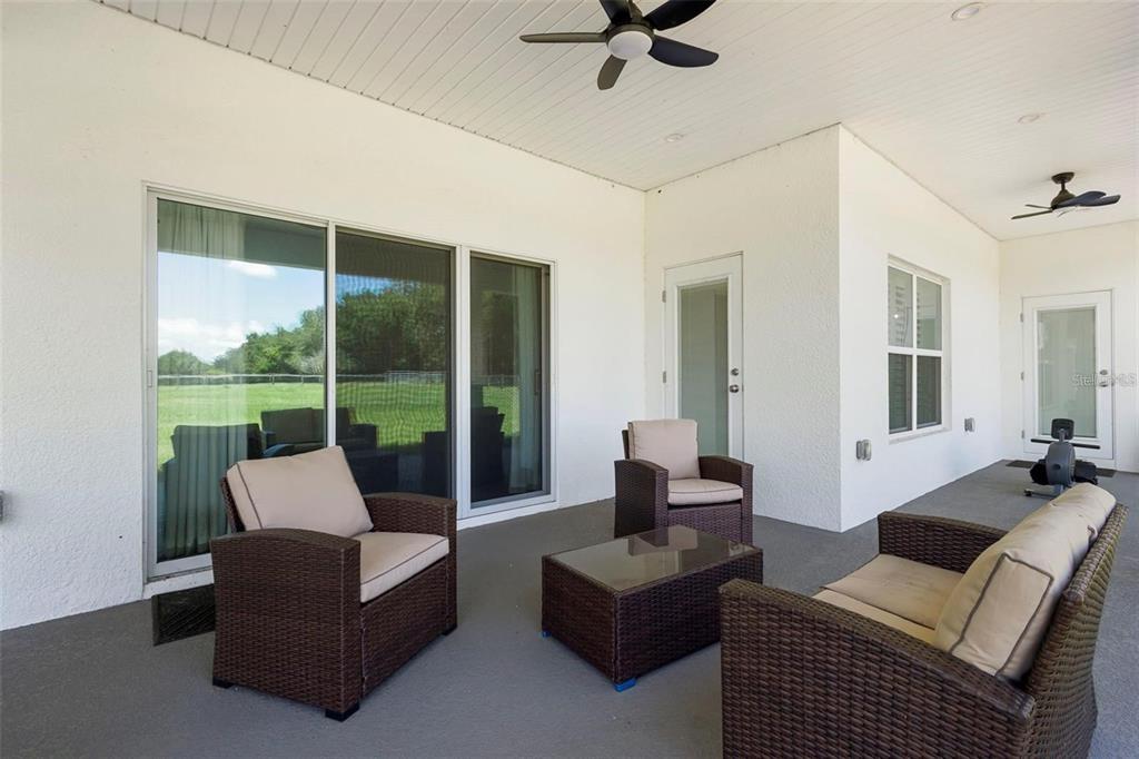 700 Old Geneva Road Geneva, FL 32732 - Photo 43 of 79 a living room with furniture and a large window