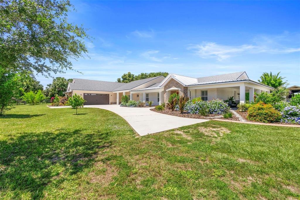 700 Old Geneva Road Geneva, FL 32732 - Photo 55 of 79 a front view of house with yard and green space