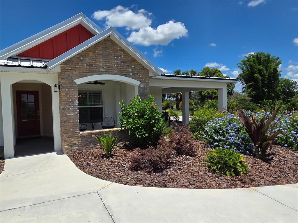 700 Old Geneva Road Geneva, FL 32732 - Photo 73 of 79 a front view of a house with garden
