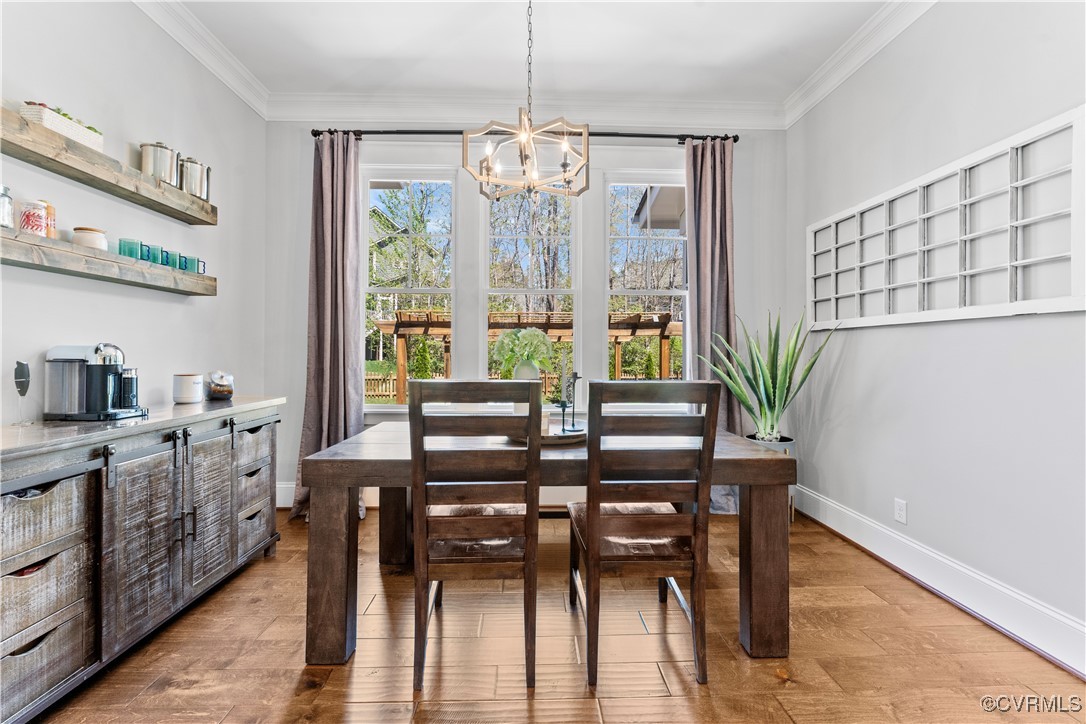 2437 Mitchells Mill Drive Midlothian, VA 23112 - Photo 13 of 50 a view of a dining room with furniture window and outside view