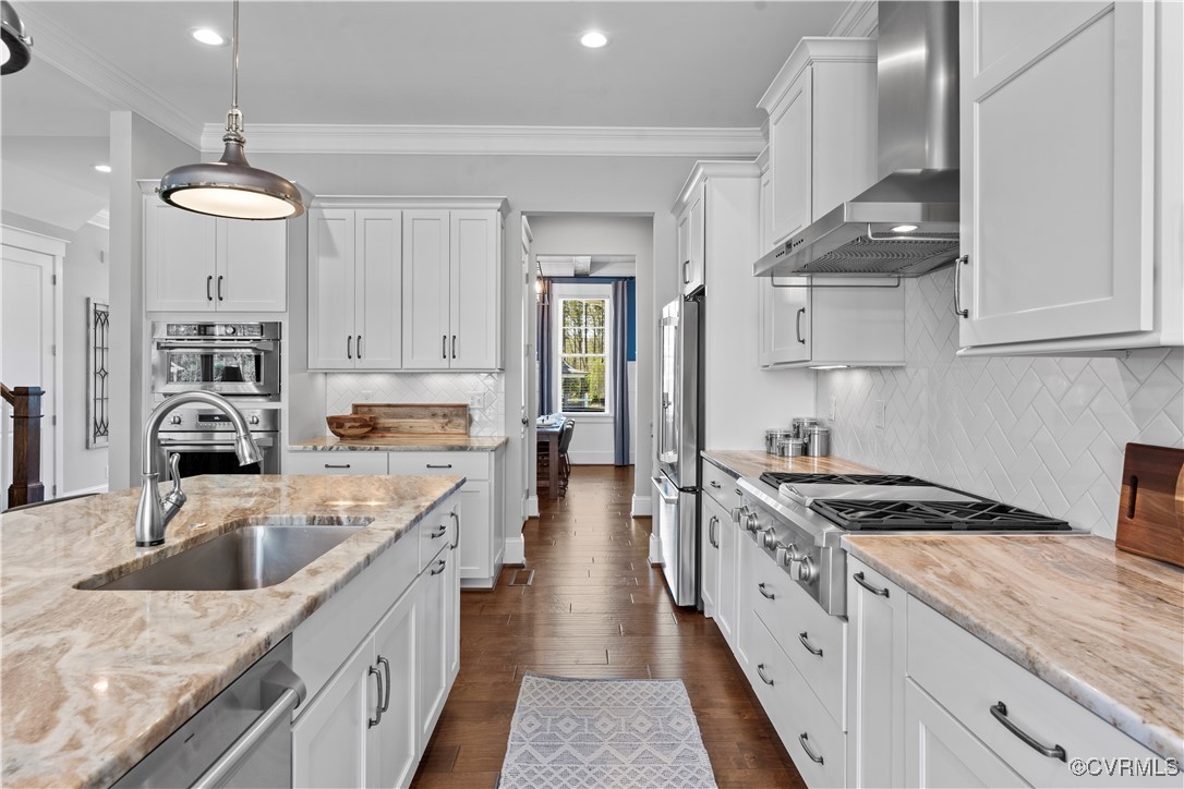 2437 Mitchells Mill Drive Midlothian, VA 23112 - Photo 14 of 50 a large kitchen with stainless steel appliances granite countertop a lot of counter space and wooden floors