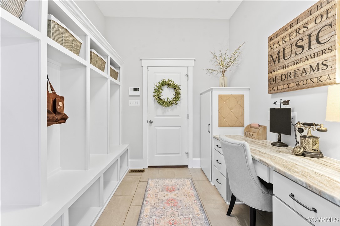 2437 Mitchells Mill Drive Midlothian, VA 23112 - Photo 20 of 50 a bathroom with a double vanity sink a mirror a vanity and a shower