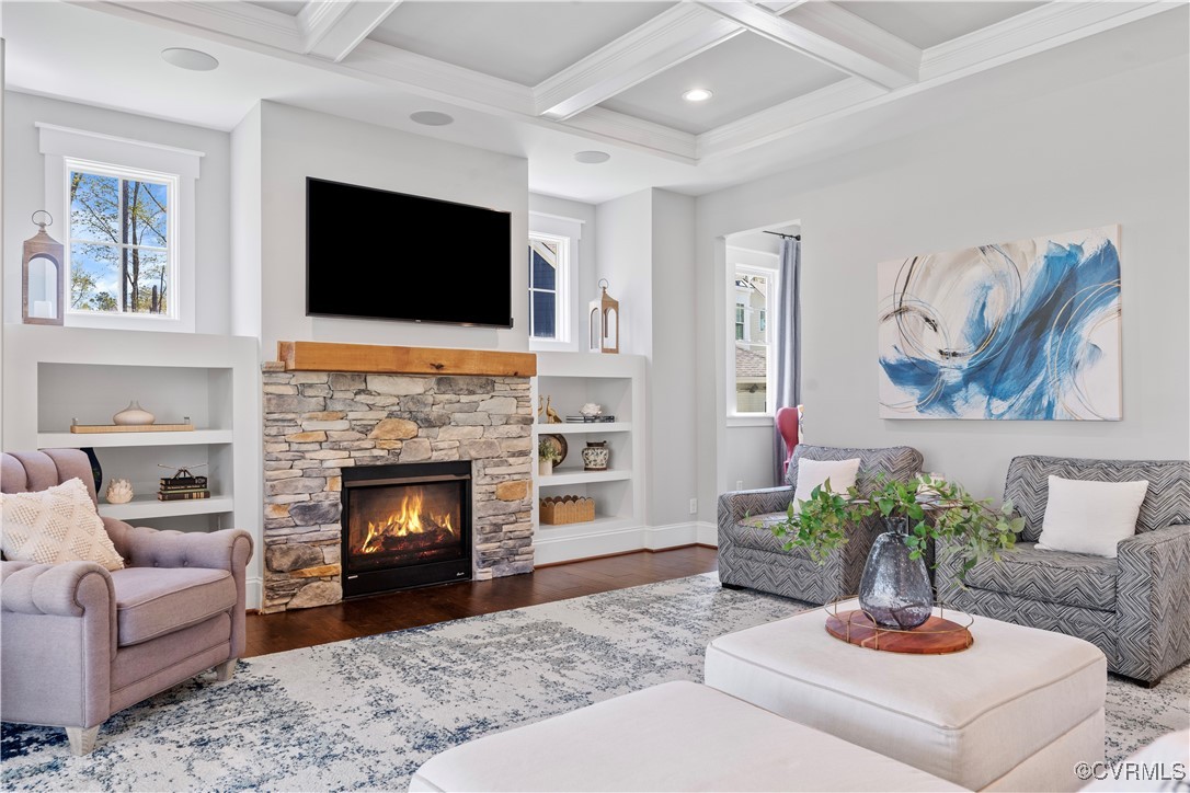 2437 Mitchells Mill Drive Midlothian, VA 23112 - Photo 22 of 50 a living room with furniture a flat screen tv and a fireplace