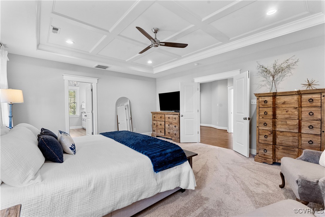 2437 Mitchells Mill Drive Midlothian, VA 23112 - Photo 27 of 50 a bedroom with a large bed a flat tv screen and a dresser