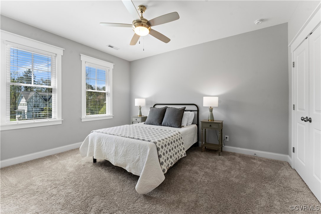 2437 Mitchells Mill Drive Midlothian, VA 23112 - Photo 32 of 50 a bedroom with a bed and a window