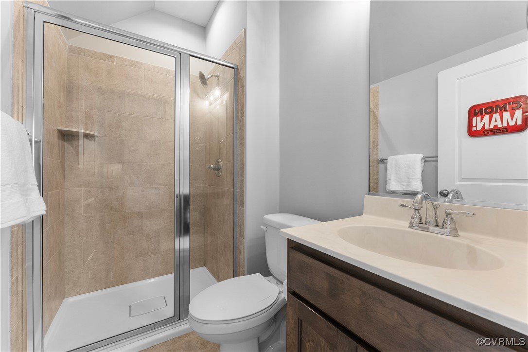 2437 Mitchells Mill Drive Midlothian, VA 23112 - Photo 36 of 50 a bathroom with a sink toilet and shower