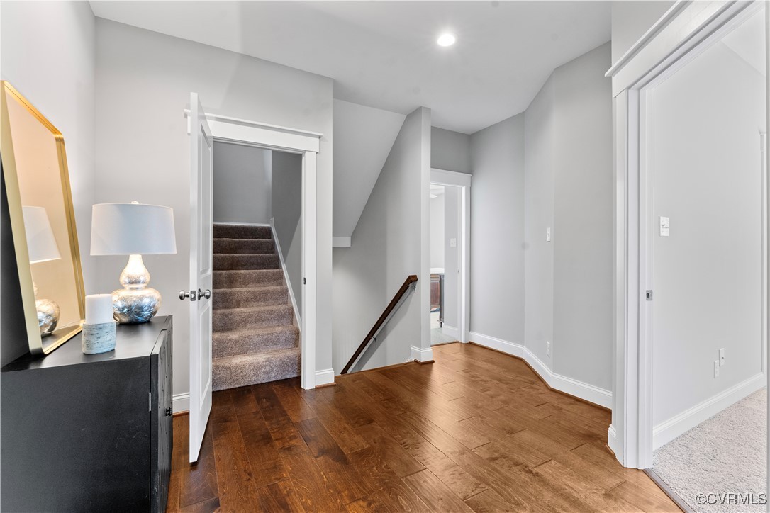 2437 Mitchells Mill Drive Midlothian, VA 23112 - Photo 37 of 50 a view of a hallway view with wooden floor and staircase