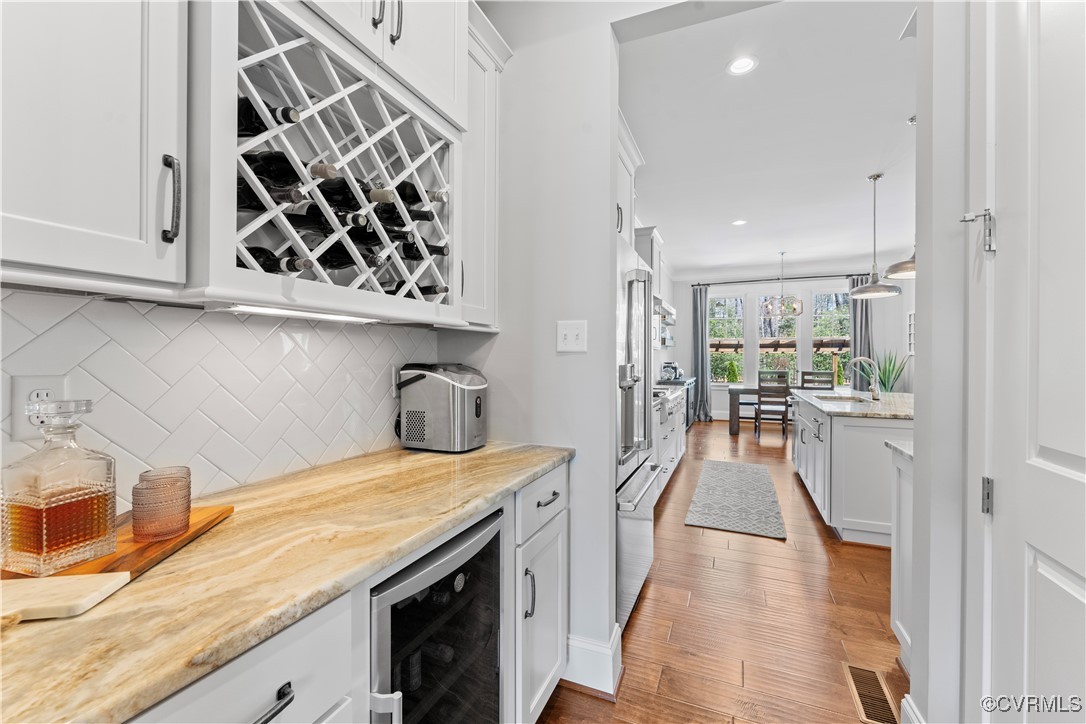 2437 Mitchells Mill Drive Midlothian, VA 23112 - Photo 10 of 50 a kitchen with a sink and a stove