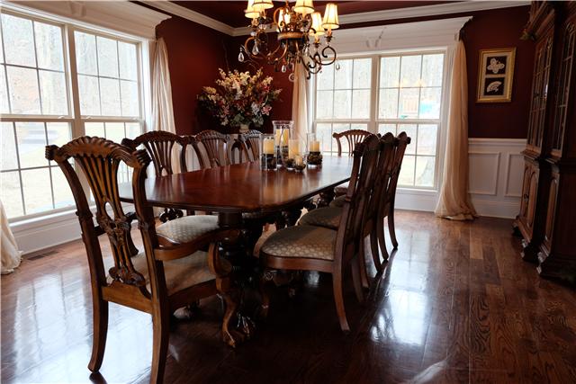 131 Ridgebend Drive Murfreesboro, TN 37128 - Photo 5 of 20 Formal dining room will accommodate any size table under the elegant chandelier and offers a place for special festive meals.