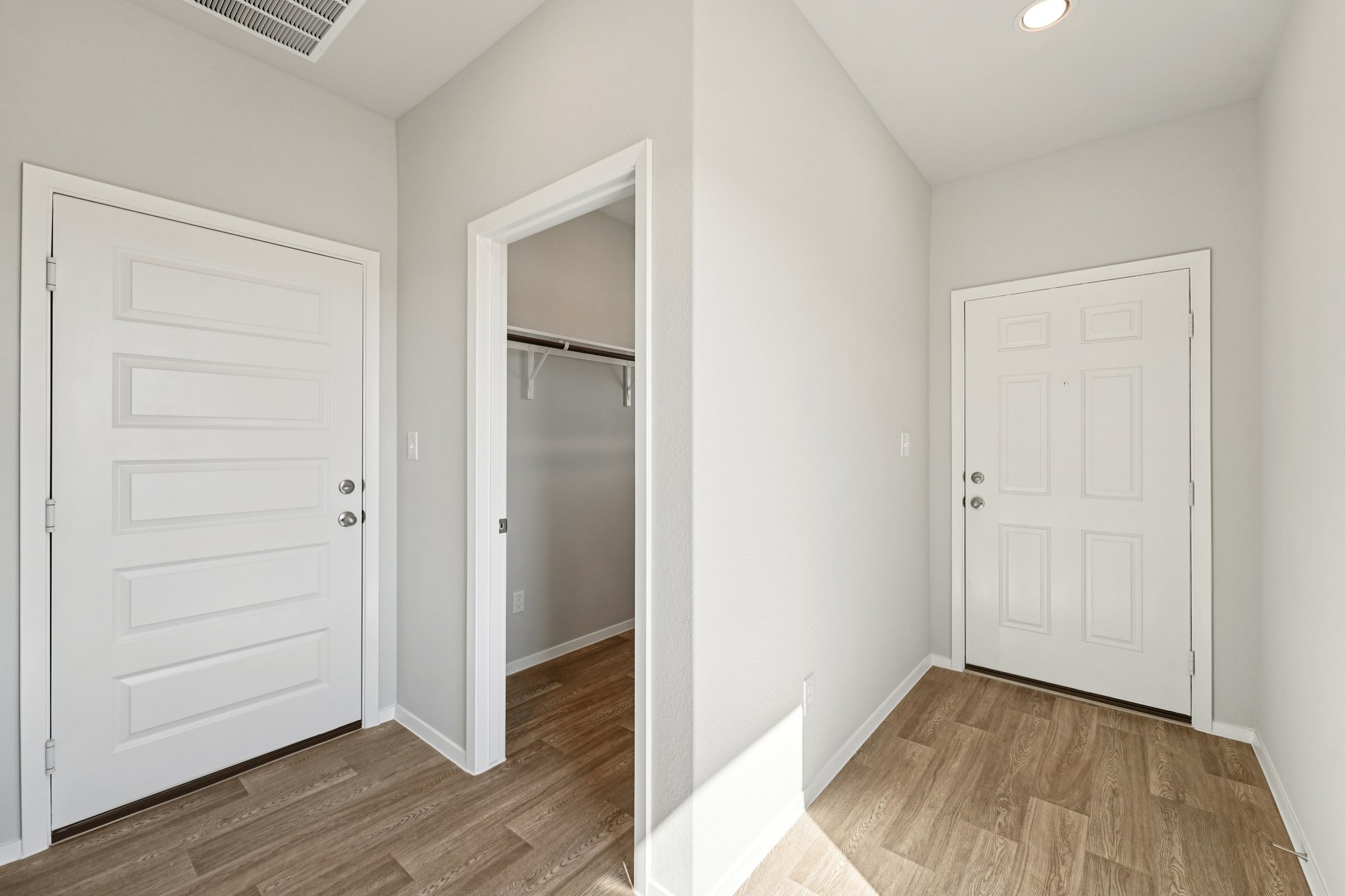 136 Summer Drive Elgin, TX 78621 - Photo 6 of 35 Entry Foyer of Home & Utility Room