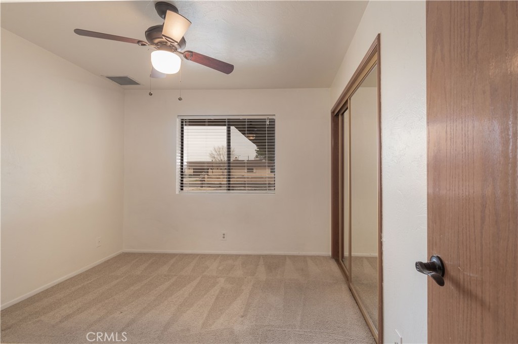 14760 Keota Road Apple Valley, CA 92307 - Photo 17 of 34 an empty room with a window