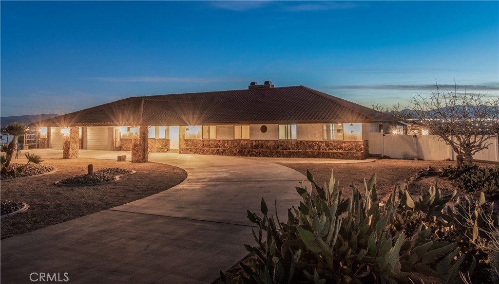 14760 Keota Road Apple Valley, CA 92307 - Photo 2 of 34 a view of a house with backyard and sitting area