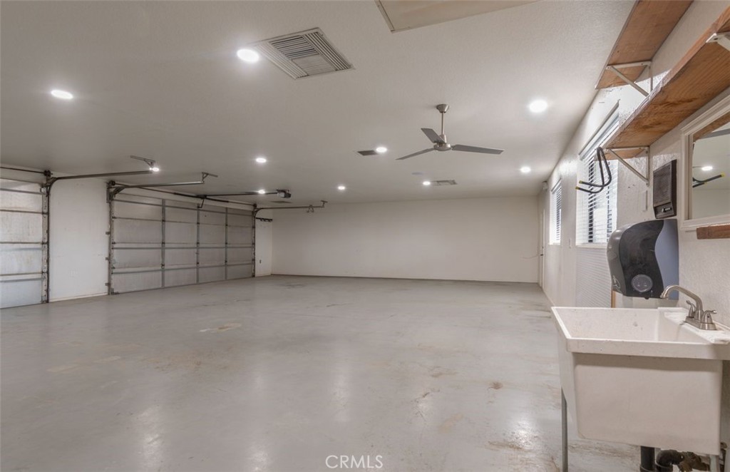 14760 Keota Road Apple Valley, CA 92307 - Photo 3 of 34 a view of a livingroom with furniture and a ceiling fan