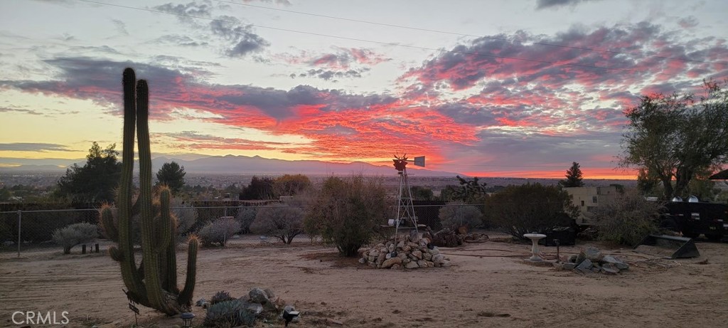 14760 Keota Road Apple Valley, CA 92307 - Photo 32 of 34 a view of a terrace with a view of the trees