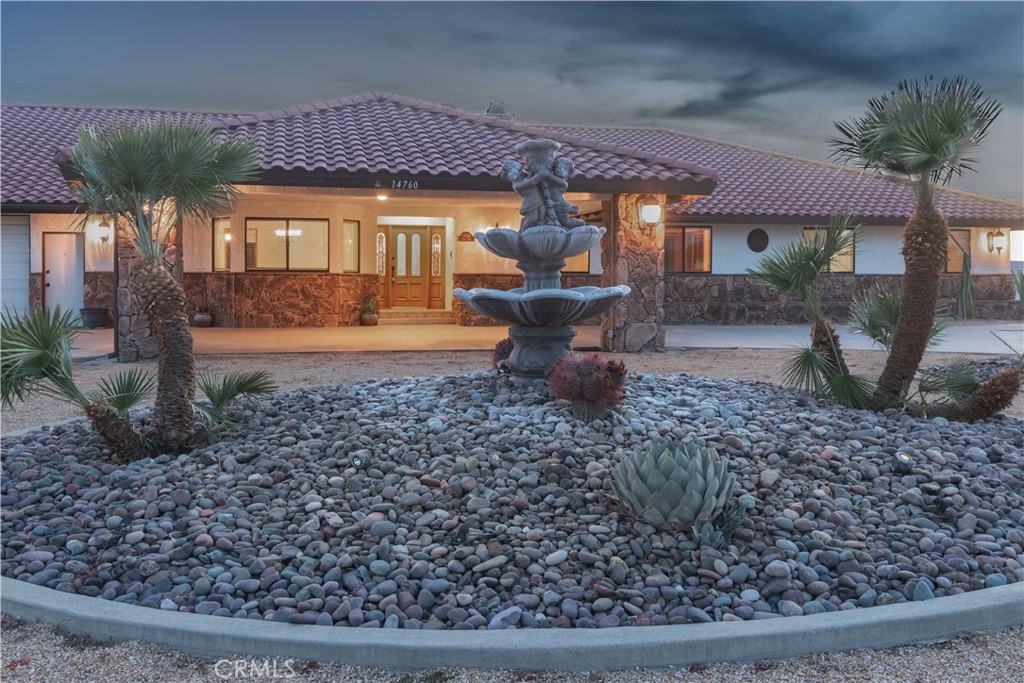 14760 Keota Road Apple Valley, CA 92307 - Photo 6 of 34 a front view of a house with garden