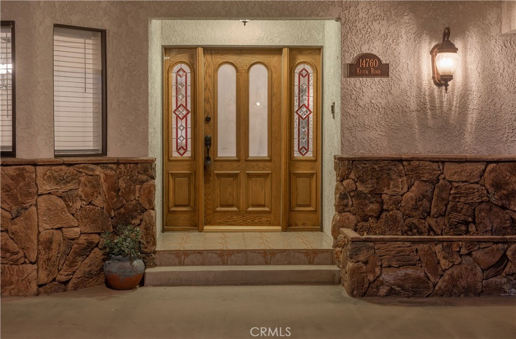 14760 Keota Road Apple Valley, CA 92307 - Photo 7 of 34 a view of a entryway door of the house