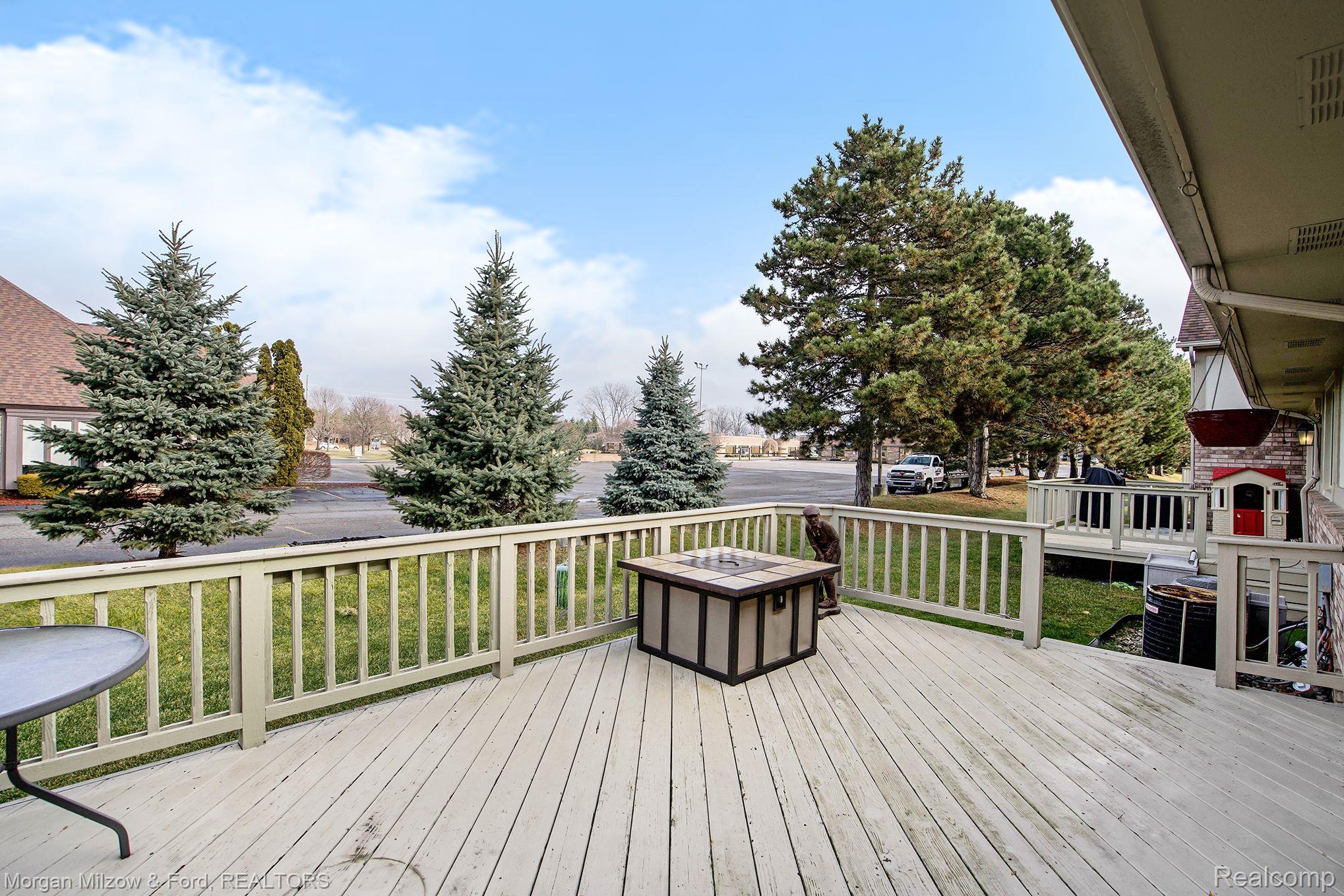 15475 Heather Ridge Trail Clinton Township, MI 48038 - Photo 22 of 24 Sprawling deck!