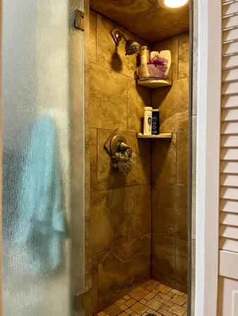 a bathroom with a sink vanity and a mirror