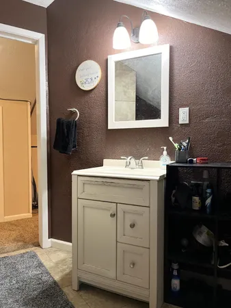 a very nice looking room with a bathroom