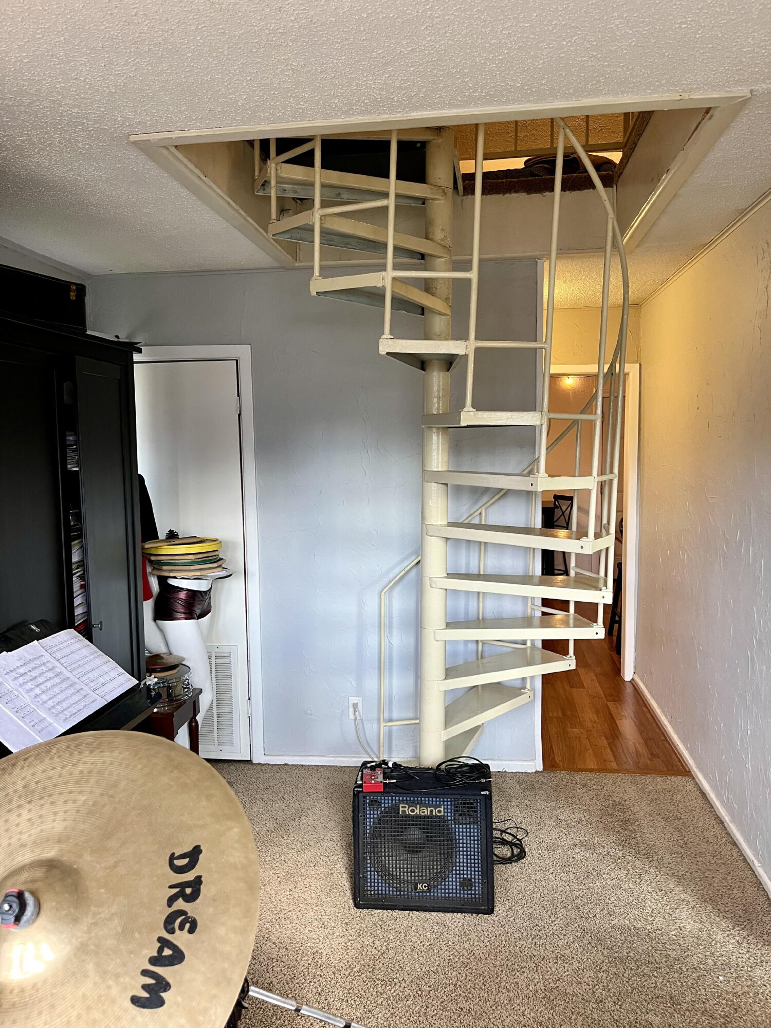 1724 28th Street Lubbock, TX 79411 - Photo 7 of 26 a bedroom with a bed and dresser