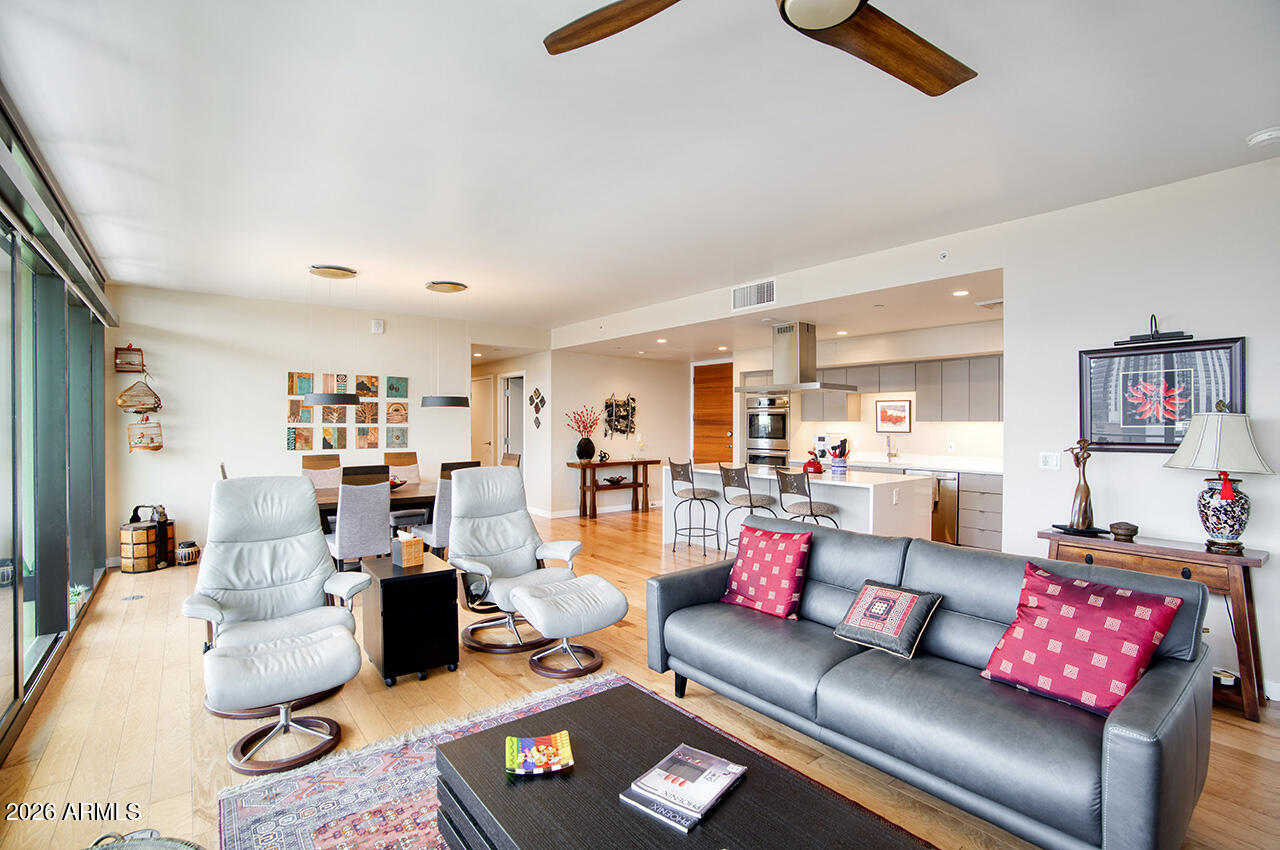 200 West Portland Street, Unit 1113 Phoenix, AZ 85003 - Photo 13 of 85 a living room with furniture and a view of bedroom