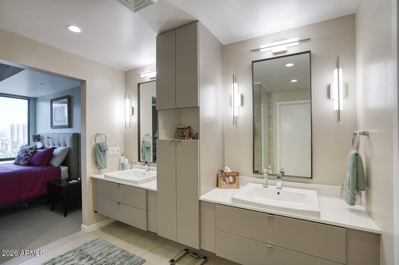 200 West Portland Street, Unit 1113 Phoenix, AZ 85003 - Photo 22 of 85 a bathroom with a double vanity sink mirror and double