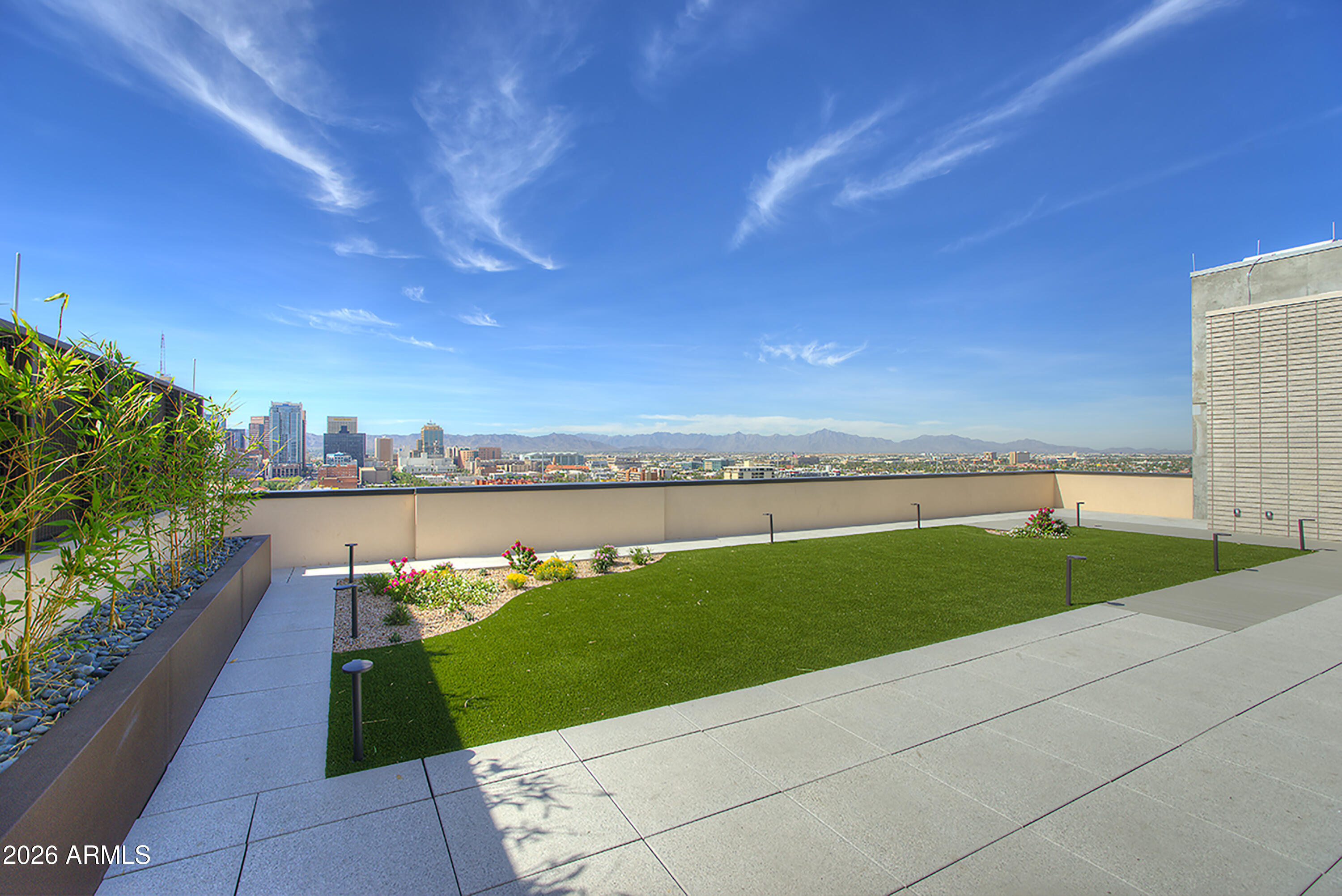 200 West Portland Street, Unit 1113 Phoenix, AZ 85003 - Photo 51 of 85 a view of a terrace with a garden
