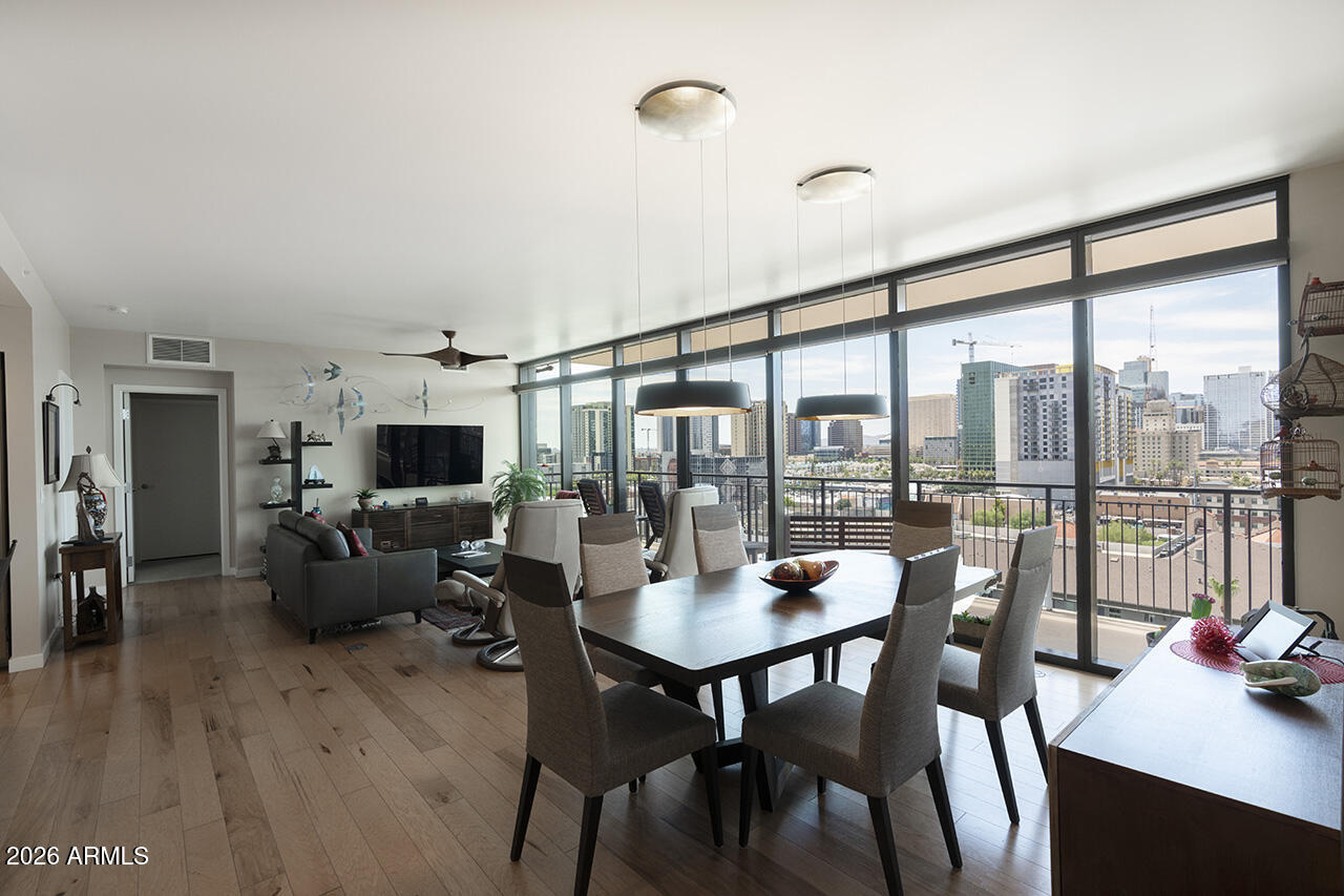 200 West Portland Street, Unit 1113 Phoenix, AZ 85003 - Photo 7 of 85 a living room with furniture and a large window