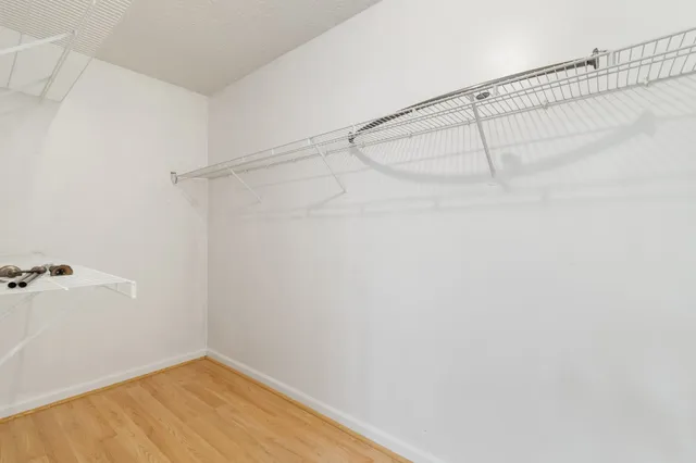 a view of a house with a wooden deck