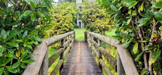a view of balcony and wooden floor