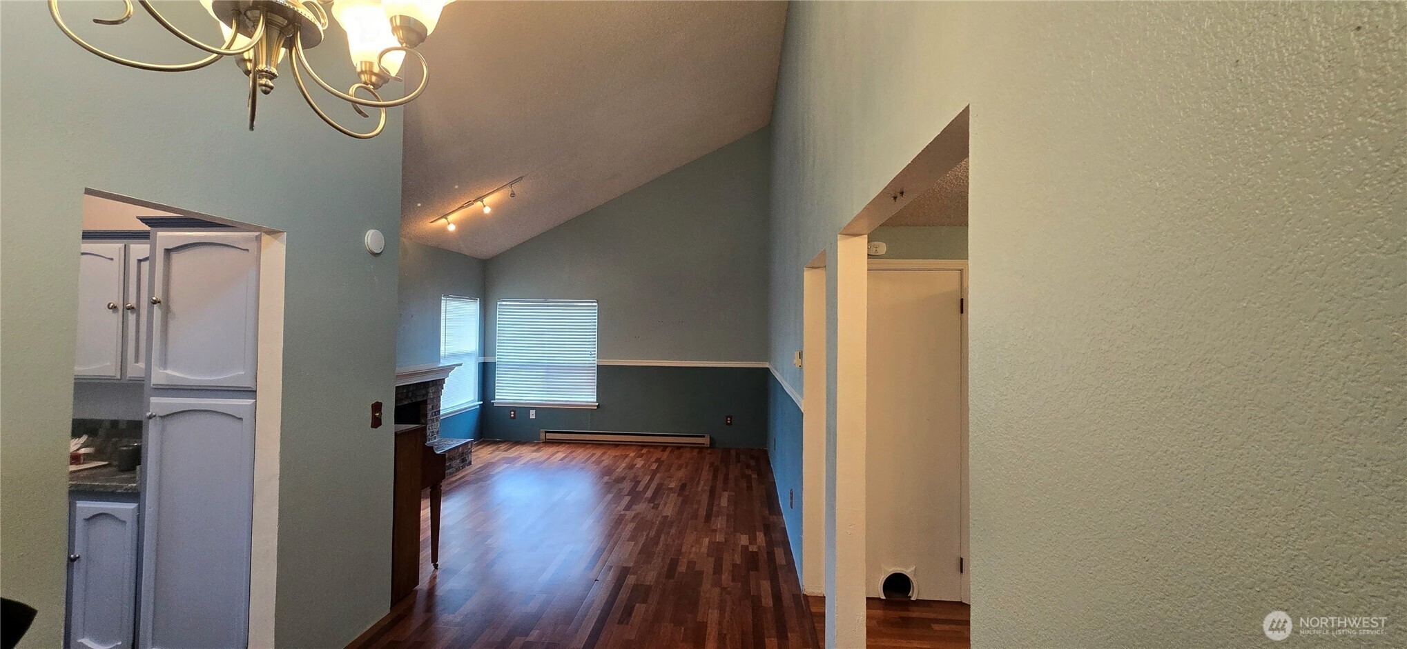 820 Cady Road, Unit H304 Everett, WA 98203 - Photo 8 of 28 a view of entryway and hall with wooden floor