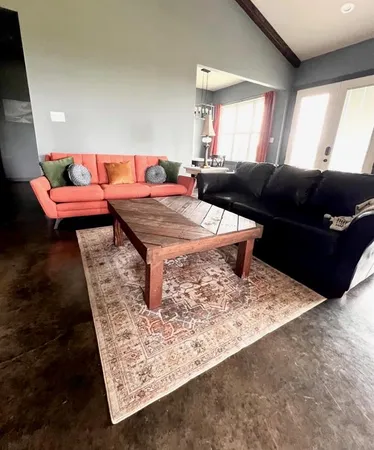 a living room with a couch and a coffee table